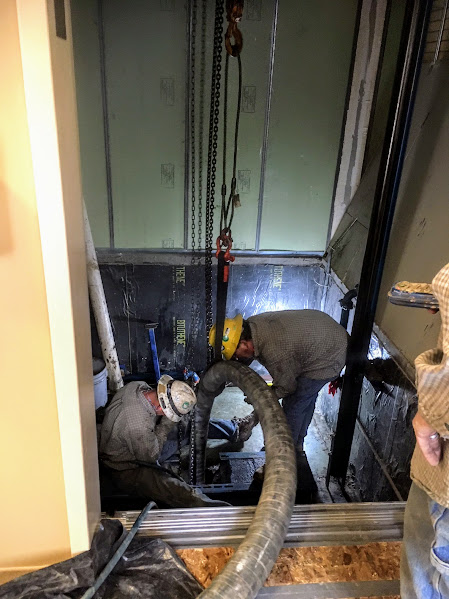 IMG_0609 clean out hole for elevator hydraulic ram