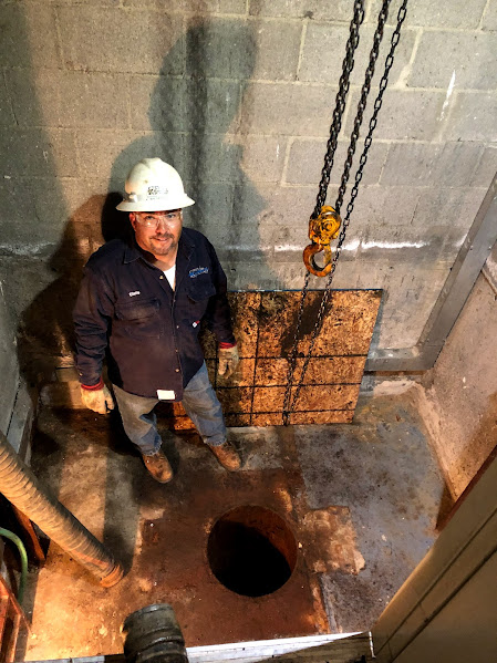 IMG_0847 Clean out hole for hydraulic ram of elevator